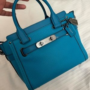 Coach Swagger 21: new, with original dusty bag.